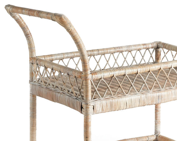 Wicker bar cart with a white background