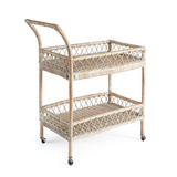 Wicker bar cart with two shelves on a white background