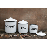 Store your coffee, tea, and sugar in style with these adorable canisters. Each canister is white and accented with black lettering. The largest canister has the word "coffee," the medium-sized canister features the word "tea," and the smallest canister has the word "sugar" on it. The lid is accented with a black rim. This canister set makes for a great wedding gift.
