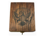 Wooden box with engraved eagle design on a white background