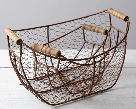 Set of 2 dark brown chicken wire baskets

This set of two baskets can be useful in any room in the home. They have a unique copper finish and rustic wood handles. These baskets would also be great for use as gift baskets.

Materials:
Metal, wood

Dimensions:
Smallest basket -
8