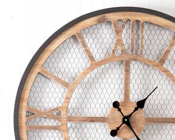 Rustic farmhouse chicken wire wall clock

This charming clock will make you feel right at home with the farm. Rustic, yet stylish and functional, this clock is an impressive focal point on a wall. It requires one AA battery, which is not included. 

Materials:
Wood, metal, plastic

Dimensions:
1 1/4