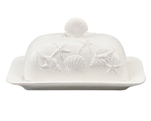 Crafted with meticulous attention to detail, this ceramic butter dish is perfect for a beach house. It features creamy white sea shells and starfish along the side and is topped with a shell-shaped knob on top. This is a great gift for the beach lover in your life.
