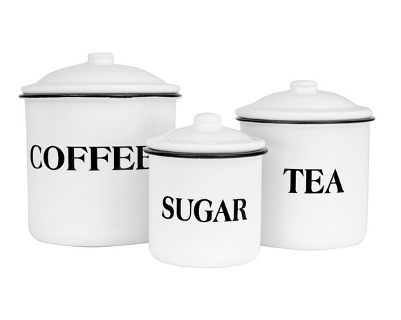 Store your coffee, tea, and sugar in style with these adorable canisters. Each canister is white and accented with black lettering. The largest canister has the word 