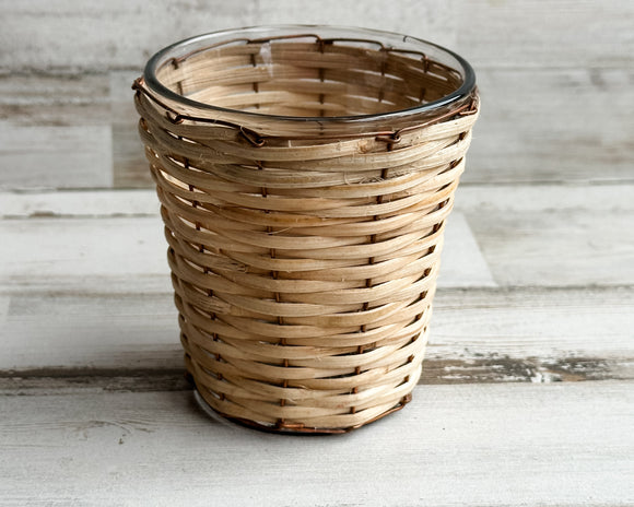Bamboo & copper votive candle holder

Bring a natural element into your home with our bamboo- and copper-wrapped glass votive candle holders. Each votive is expertly crafted and handwoven from sustainably sourced bamboo. Add it to a table or shelf for a glowing fixture that sets the mood of your chosen theme.

Materials:
Glass, copper, bamboo

Dimensions:
2 3/4