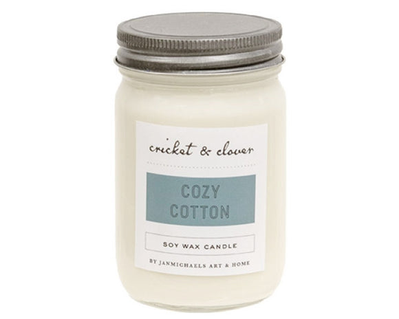 The cozy cotton candle is a hand-poured candle made of premium soy wax. This candle has a single lead-free wick for a slow and even burn, lasting up to 84 hours in burn-time. The candle features the soft, fresh scent of crisp perfumed cotton linens, and includes a screw-top lid to preserve the original aroma. Pair this candle with a ring or mat for a decorative display year-round.   This item is proudly made in the USA.  Materials: Glass, soy wax