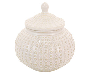 Cream dotted cookie jar

Who stole the cookie from the cookie jar? You won't be able to blame anyone for sneaking a peek in this beautiful textured piece! It's both aesthetically pleasing and practical! This dotted design adds a unique flair and a charming kick of personality. Add almost 4 pounds, this cookie jar is not only beautiful but quite sturdy.

Materials:
Ceramic

Dimensions:
7 3/4" wide x 7 3/4" deep x 9" high