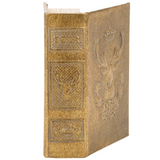  This small decorative book box is inspired by rustic cabin decor. It features a textured faux leather wrap displaying the exterior of a vintage book with an aged metallic gold finish on an embossed deer emblem design. It also displays a coordinating embossed gold design on its side to give the appearance of a book spine when on a shelf. 