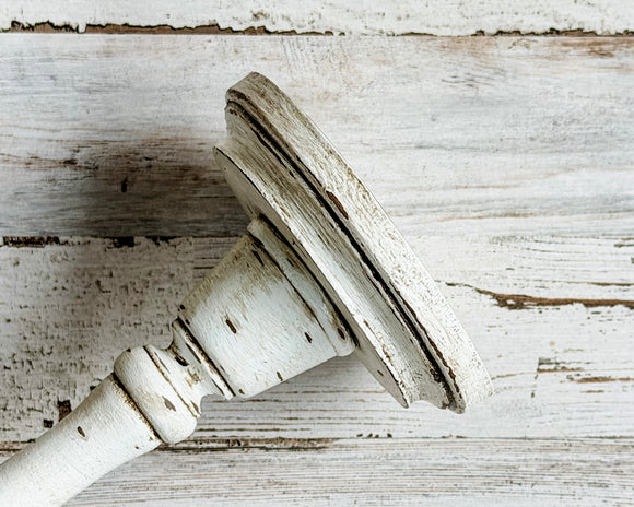  If you’re looking for rustic dining table decorations or shelf decor, look no further! These hand-painted, wood candle holders complement almost any home or dining room decor. And they are a great choice for a farmhouse chic wedding reception. Place several of these candlesticks in a group for centerpiece or on a mantel in a living room for a vintage-inspired candlescape. 