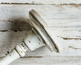  If you’re looking for rustic dining table decorations or shelf decor, look no further! These hand-painted, wood candle holders complement almost any home or dining room decor. And they are a great choice for a farmhouse chic wedding reception. Place several of these candlesticks in a group for centerpiece or on a mantel in a living room for a vintage-inspired candlescape. 