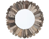 Round mirror with a decorative frame made of stacked wooden planks on a white background