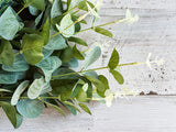 Artificial green eucalyptus bush for arrangements

Create stunning arrangements, wreaths, or simply display this eucalyptus spray in a vase for a touch of greenery that lasts a lifetime. Add a little outdoors into any space with this lifelike eucalyptus.&nbsp;

Materials:
Plastic, fabric

Dimensions:
17" long
