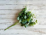Artificial green eucalyptus bush for arrangements

Create stunning arrangements, wreaths, or simply display this eucalyptus spray in a vase for a touch of greenery that lasts a lifetime. Add a little outdoors into any space with this lifelike eucalyptus.&nbsp;

Materials:
Plastic, fabric

Dimensions:
17" long