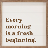 Wooden sign with motivational quote 'Every morning is a fresh beginning.'
