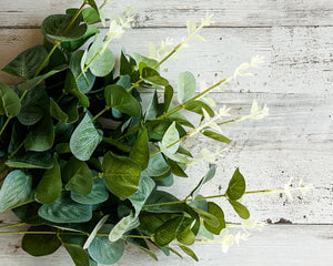 Artificial green eucalyptus bush for arrangements

Create stunning arrangements, wreaths, or simply display this eucalyptus spray in a vase for a touch of greenery that lasts a lifetime. Add a little outdoors into any space with this lifelike eucalyptus.&nbsp;

Materials:
Plastic, fabric

Dimensions:
17" long