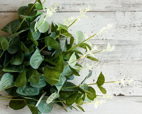 Artificial green eucalyptus bush for arrangements

Create stunning arrangements, wreaths, or simply display this eucalyptus spray in a vase for a touch of greenery that lasts a lifetime. Add a little outdoors into any space with this lifelike eucalyptus. 

Materials:
Plastic, fabric

Dimensions:
17