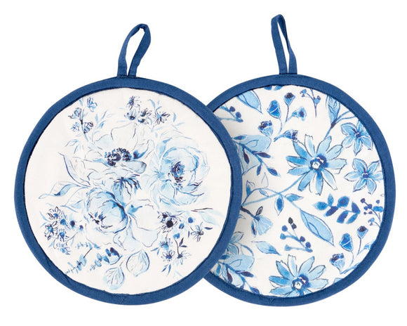 Two floral pot holders with blue and white design on a white background