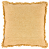 Yellow cushion with frayed edges on a white background