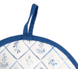 Round blue and white patterned pot holder with a hanging strap on a white background