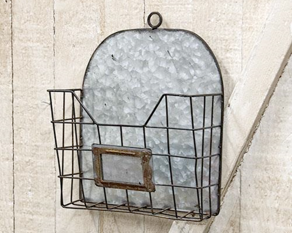 Galvanized metal wire mail wall pocket

This lovely wire mailbox has a galvanized tin back and an aged wire slot along with a wire loop at the top for easy hanging. Hang a few of these together to complete a command center or in a home office. The possibilities are endless!

Materials:
Metal

Dimensions:
7 3/4