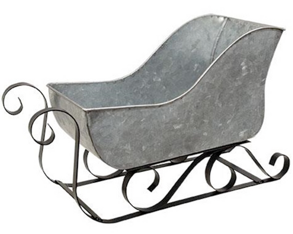 Decorative metal sleigh on a white background