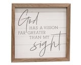 Wooden-framed sign with motivational quote on a white background