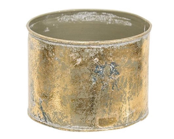 Decorative pot with gold and silver metallic finish on a white background