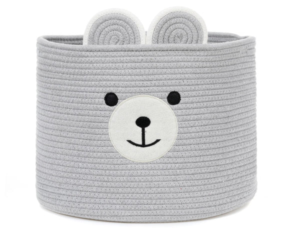 Introducing the 'Bertie Bear' organic cottage storage basket - the perfect blend of adorable design, ecoconscious materials, and practicality. This charming storage solution is not only a delightful addition to any room, but it also helps you keep your space tidy and organized in style. Crafted from premium organic cotton, this basket is not only incredibly soft to the touch but also safe for both your family and the environment. 