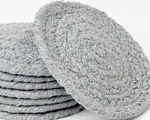 Gray braided cotton round coaster set

These coastal-inspired coasters are as practical as they are stylish. Not only will these coasters add warmth to your bars and table tops, they will also protect those surfaces from the heat of hot cups or the water from a cool beverage. You can even use them on desks to help protect your devices from splashes of coffee, energy drinks or even some water.

Materials:
100% Cotton

Dimensions:
4