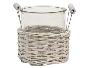 Medium gray willow basket with glass vase

This basket and vase set consists of a medium-sized glass container in a gray, woven wood basket with handles. Use this item to store pens, pencils, short-stem florals, and more!&nbsp;

Materials:
Willow, glass

Dimensions:
6" in diameter x 5 3/4" high