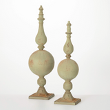 Muted green finial sculptures

Elegant and sophisticated, this finial sculpture set is the perfect addition to your home decor. Featuring an exquisite patina finish and an impressive design, this modern versatile finial set can complement any decor style.

Materials:
Metal

Dimensions:
Shorter finial -
6 1/4" diameter x 23 3/4" high

Taller finial -
7 3/4" diameter x 28" high