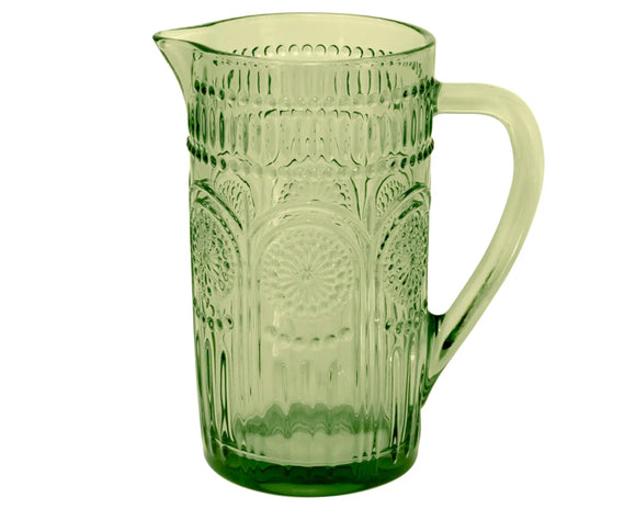 green glass pitcher with embossed design