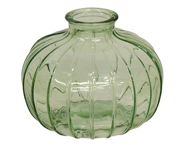Green glass bud vase

This decorative glass vase container features a round, bubbled shape and a wide-ribbed texture. The vase has a round, narrow bottle-neck and a transparent light green finish to resemble Depression-era antiques. Pair this vase with florals or greenery and display atop a tray, shelf, or table for a stylish accent in the home year-round.

Materials:
Glass

Dimensions:
3 1/2