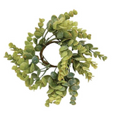 Artificial green leaf wreath on a white background