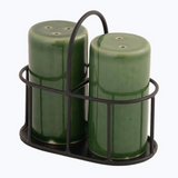 Two green salt and pepper shakers in a black holder on a white background