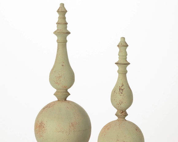 Muted green finial sculptures

Elegant and sophisticated, this finial sculpture set is the perfect addition to your home decor. Featuring an exquisite patina finish and an impressive design, this modern versatile finial set can complement any decor style.

Materials:
Metal

Dimensions:
Shorter finial -
6 1/4
