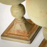 Muted green finial sculptures

Elegant and sophisticated, this finial sculpture set is the perfect addition to your home decor. Featuring an exquisite patina finish and an impressive design, this modern versatile finial set can complement any decor style.

Materials:
Metal

Dimensions:
Shorter finial -
6 1/4" diameter x 23 3/4" high

Taller finial -
7 3/4" diameter x 28" high