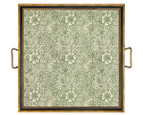 Decorative tray with floral pattern and gold handles on a white background