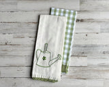 Green watering can kitchen towel set

Whether displayed as part of your spring decor or used year round, these adorable towels are perfect for your kitchen. One towel features a watering can design, and the other has a buffalo check design.&nbsp;

Each set comprises one towel of each design.&nbsp;

Materials:
Cotton

Dimensions:
18" wide x 26" long

Care:
Machine washable&nbsp;