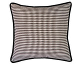 Black &amp; white houndstooth square throw pillow

Enhance your home decor with this American-made pillow. Made from 100% cotton with stylish black accent piping, it adds a classic yet contemporary touch to any room. The houndstooth pattern is perfect for pairing with other black and white decor, as well as various floral prints. The possibilities are endless!

This item is proudly made in the USA.

This pillow is sold individually, as well as in pairs and lots of four.
