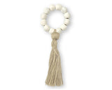 Add casual charm to your dining table with these pretty napkin rings. Each one is made of terracotta and accented with a neutral brown jute tassel. They would go great with neutral home decor or colorful. The possibilities are endless!

These napkin rings are sold individually, as well as in lots of four, lots of six, lots of 12, and lots of 20.
