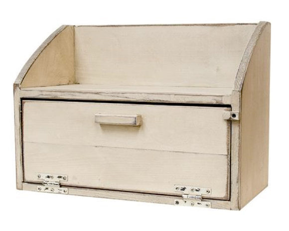 This bread box is an attractive, functional container with an ivory painted finish and distressed detailing. The box features hinged door that opens for secure storeage. This box makes a great addition to a kitchen countertop. It is proudly made in the USA.