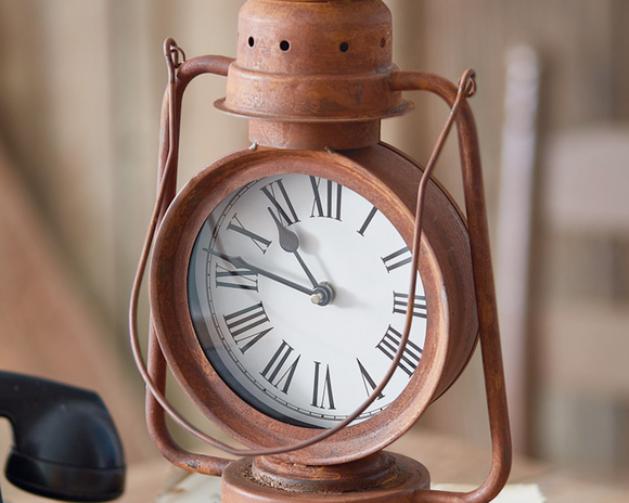 Vintage style lantern clock

Fashioned as a repurposed kerosene lantern, this unique clock will bring a rustic touch to a home. This item can be hung with a hook by its metal loop or placed on a shelf. This clock requires one AA battery, which is not included with your purchase.

Materials:
Metal, plastic

Dimensions:
8