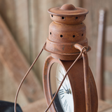 Vintage style lantern clock

Fashioned as a repurposed kerosene lantern, this unique clock will bring a rustic touch to a home. This item can be hung with a hook by its metal loop or placed on a shelf. This clock requires one AA battery, which is not included with your purchase.

Materials:
Metal, plastic

Dimensions:
8" wide x 6" deep x 12 3/4" high