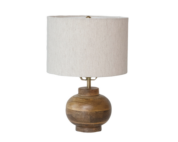 Mango wood table lamp with shade

Add a natural element to your space with this attractive table lamp. It features a natural mango wood base and linen lamp shade in a neutral shade. Due to its shorter height, it is the perfect size for a dorm room or nursery.

Materials:
Mango wood, metal, linen

Dimensions:
10