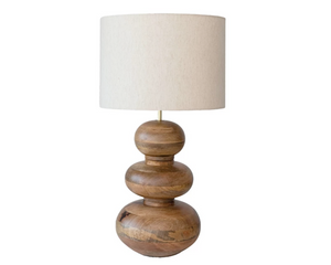 Wooden table lamp with a beige lampshade on a white background