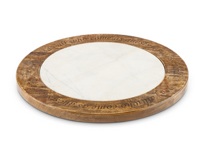Round wooden Lazy Susan with marble center on a white background