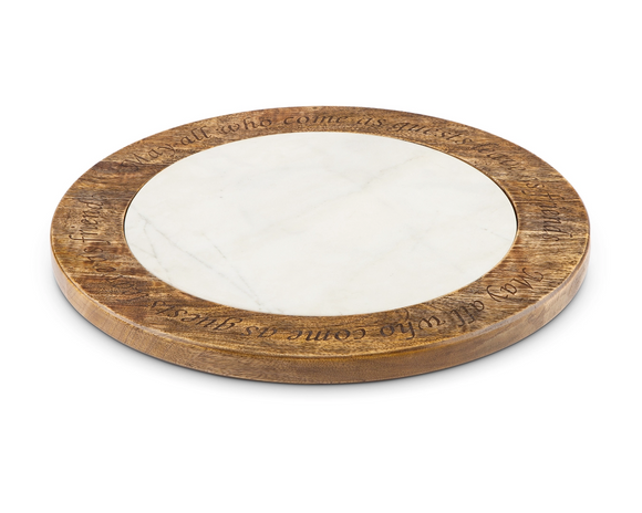 Round wooden Lazy Susan with marble center on a white background