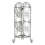 Antique style green corner plant stand

Show off your green thumb with this gorgeous plant stand! Perfect for both indoors and outdoors, this stand features an antiqued faux-verdigris finish and three shelves, which can be adjusted for tall plants. It will look good anywhere in your home from a statement porch piece, sun room storage, garden enhancement, or patio accent. Customize with the greenery of your choice and watch your home bloom!&nbsp;

Materials:
Metal

Dimensions:
12 1/2" wide x 9" deep x 30 1/4