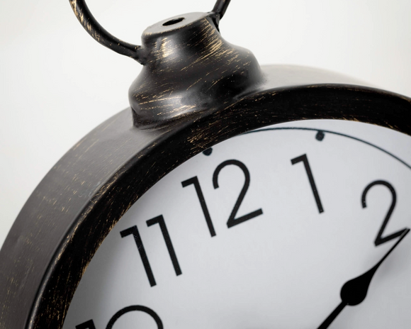 Vintage style round black metal desk clock

Step back in time with this antique-inspired black metal desk clock. Featuring bold numbers, wood accents, and a handle that resembles the olden days, this time keeper will help you stay on task and on schedule.

Materials:
Metal

Dimensions:
6 1/2